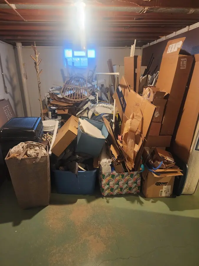 Roll-off dumpster container at job site for 8 Yard Dumpster Rental in Hilltown